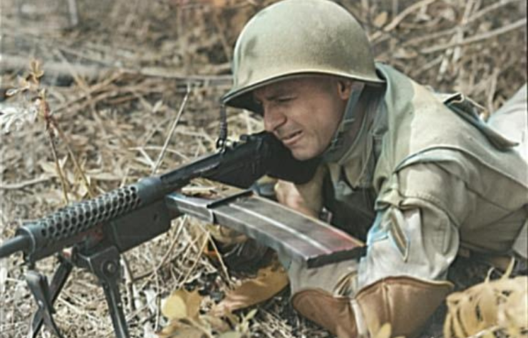 Soldier aiming an M1941 Johnson light machine gun