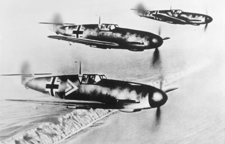 Three Messerschmitt Bf 109s in flight