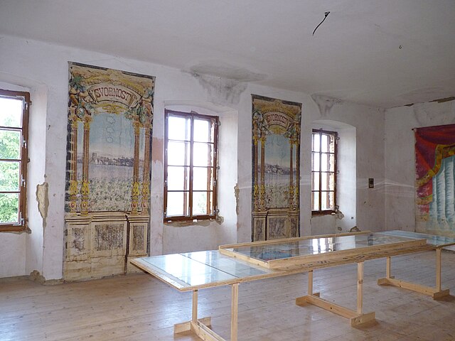Large table in a bright room in Dobrš Castle