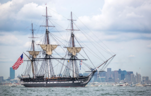 USS Constitution sailing through Boston Harbor