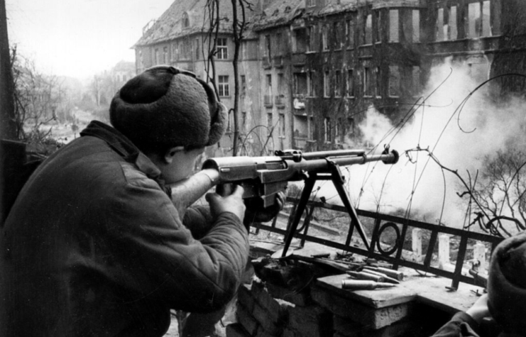 Red Army soldier aiming an anti-tank gun