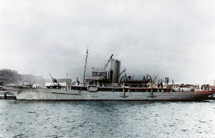 USS Cythera (PY-26) anchored at a dock