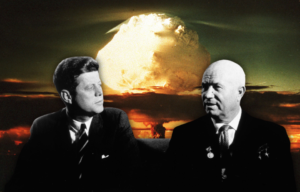 Mushroom cloud rising into the sky + John F. Kennedy and Nikita Khrushchev sitting together