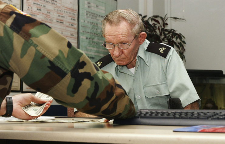 Charles Robert Jenkins sat in front of a US Army officer at a table