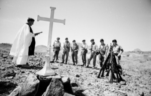 Raymond Roberts performing a prayer service for a British Army patrol