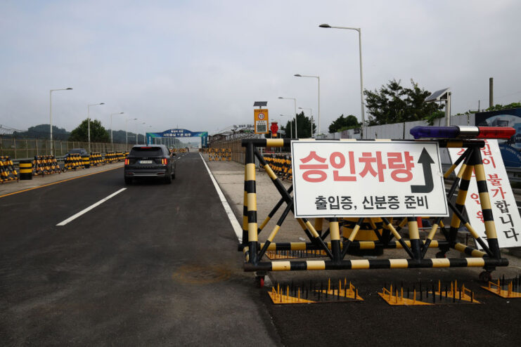 Car driving near the Unification Bridge