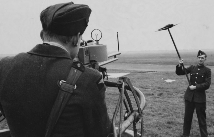 Two Royal Air Force (RAF) pilots training on how to shoot down enemy pilots in the air