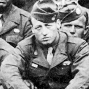 Babe Heffron sitting with his comrades