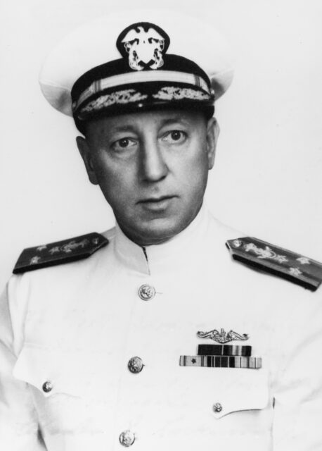 Black and white portrait of Charles A. Lockwood Jr. in Navy Uniform and white background. 