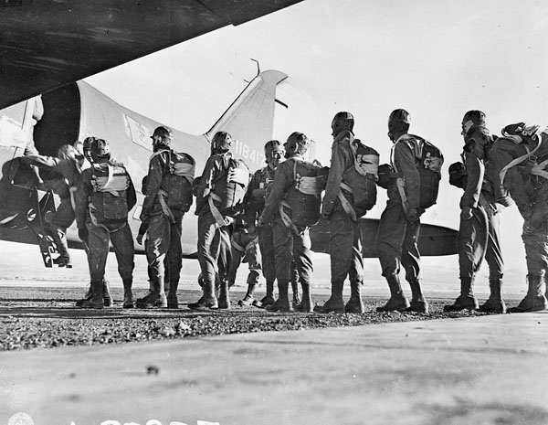 1st Special Service Force members boarding a C-47. Black and white.