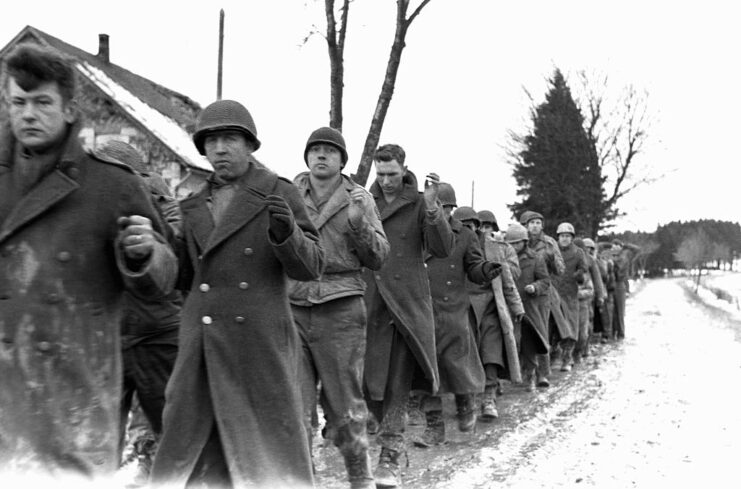 American prisoners of war (POWs) marching through the snow