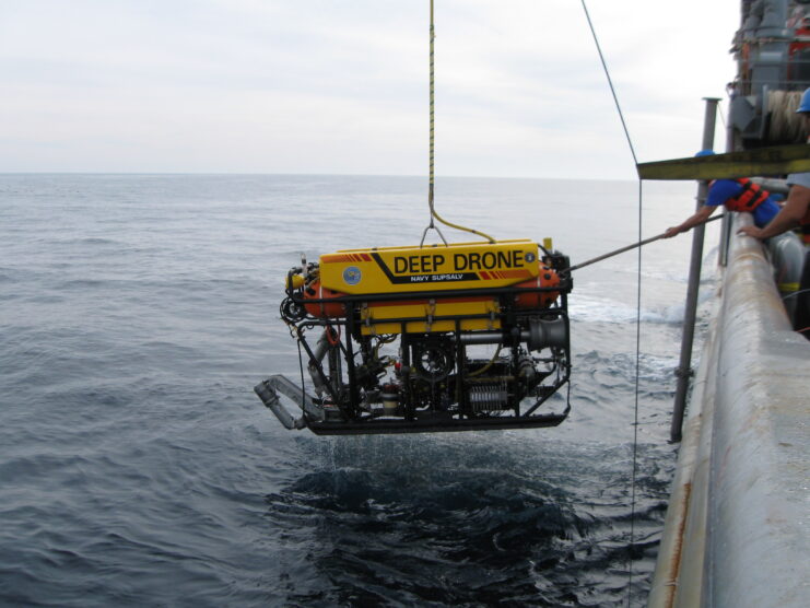 Remotely operated vehicle (ROV) being dropped into the ocean