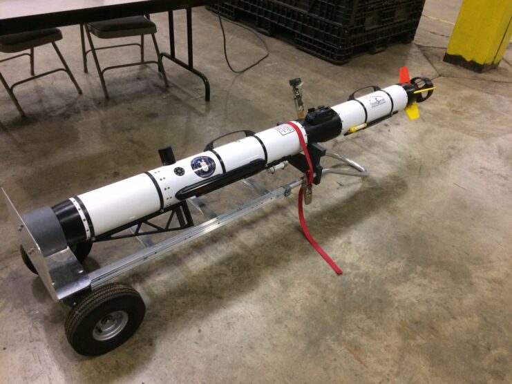 Remotely operated vehicle (ROV) sitting in the middle of a warehouse