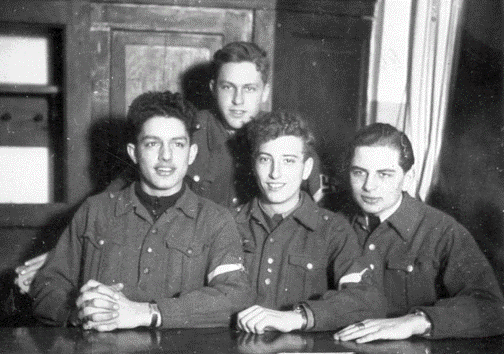 Emanuel von König sitting with three of his shipmates