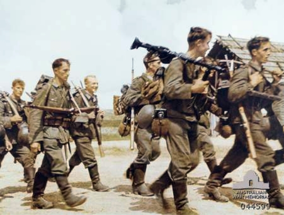 German soldiers walking together through a town