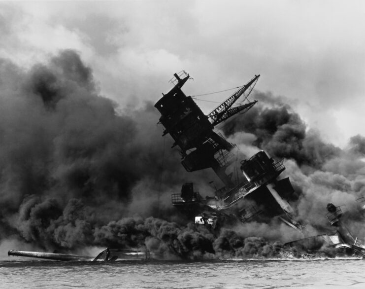 USS Arizona (BB-39) shrouded in smoke