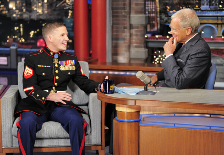 Kyle Carpenter speaking with David Letterman on the set of the 'Late Show with David Letterman'