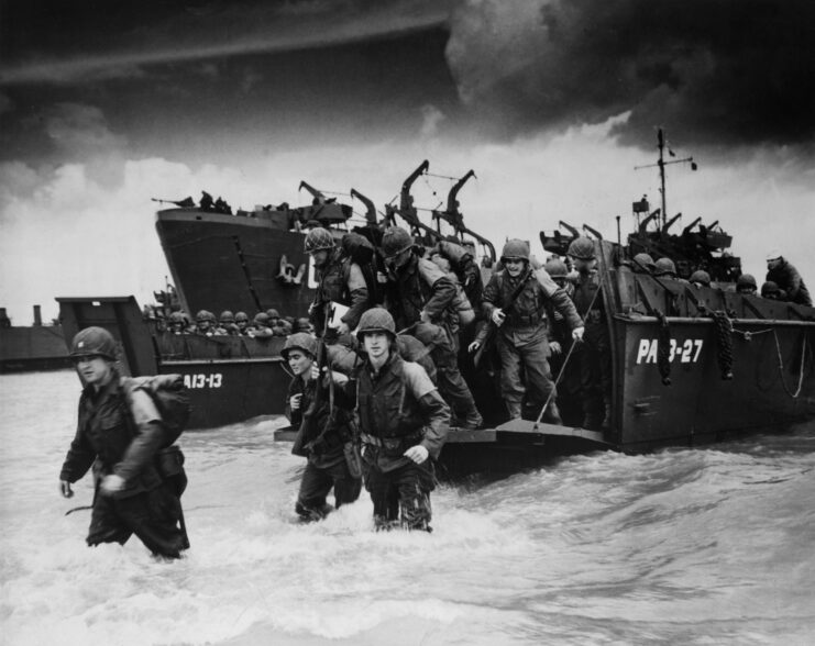 Reinforcements exiting into the water to land on the beaches of Normandy. 