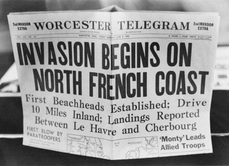 Newspaper front page featuring headlines about the D-Day landings
