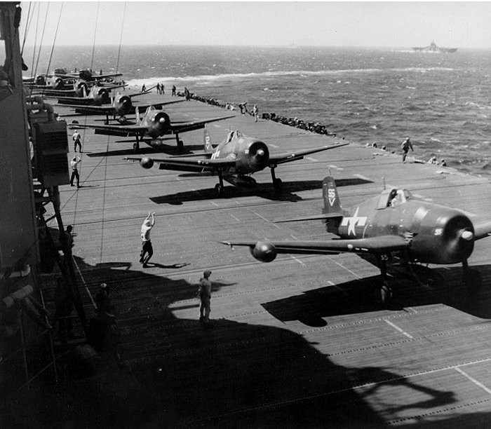 Grumman F6F "Hellcat" fighters on the USS Ticonderoga. Black and white. 