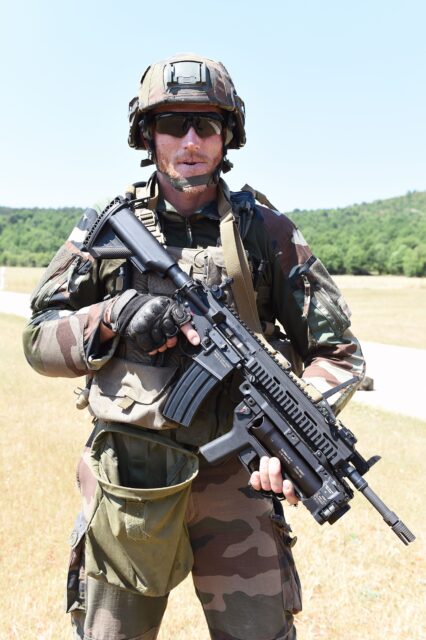 A French soldier holding a HK 416. 