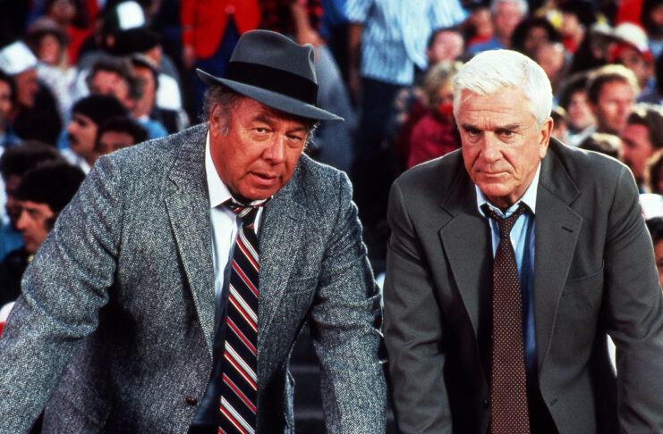 Still of George Kennedy and Leslie Nielsen in 'The Naked Gun.'