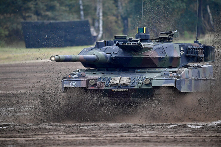 Leopard 2A7+ driving through dirt