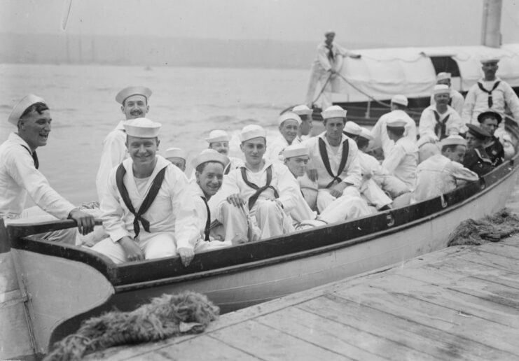 US Navy sailors crowded into a small boat