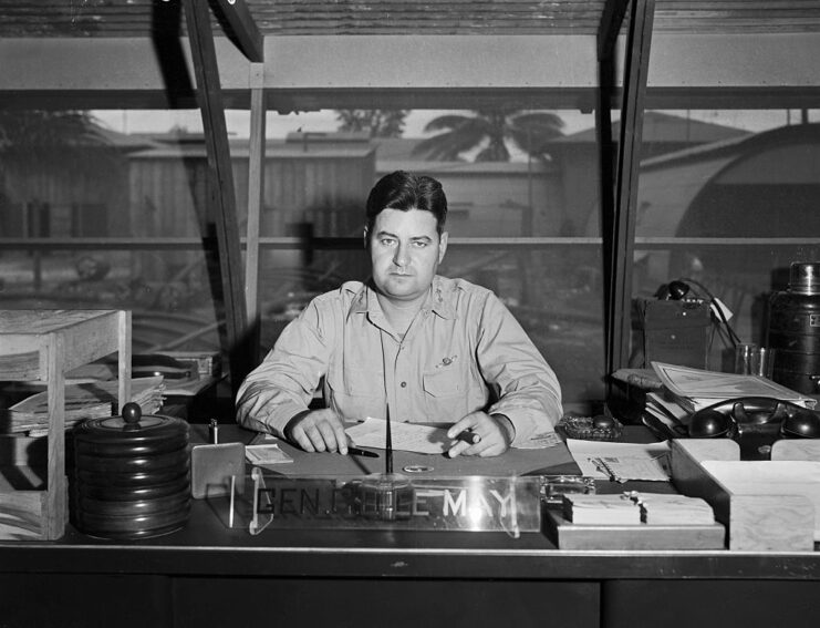 Curtis LeMay sits at his desk