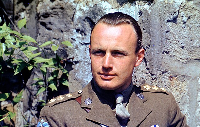 Geoffrey Appleyard standing outside in his military uniform