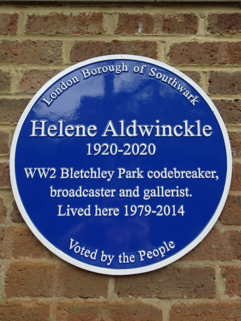 Blue circular plaque reading 'Helene Aldwinckle 1920-2020 WW2 Bletchley Park codebreaker, broadcaster and gallerist. Lived here 1979-2014.'