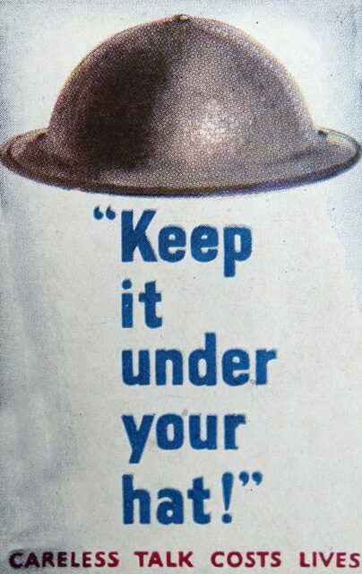 World War II-era propaganda poster featuring an illustration of a soldier's helmet and the text, "'Keep it under your hat!' / CARELESS TALK COSTS LIVES"