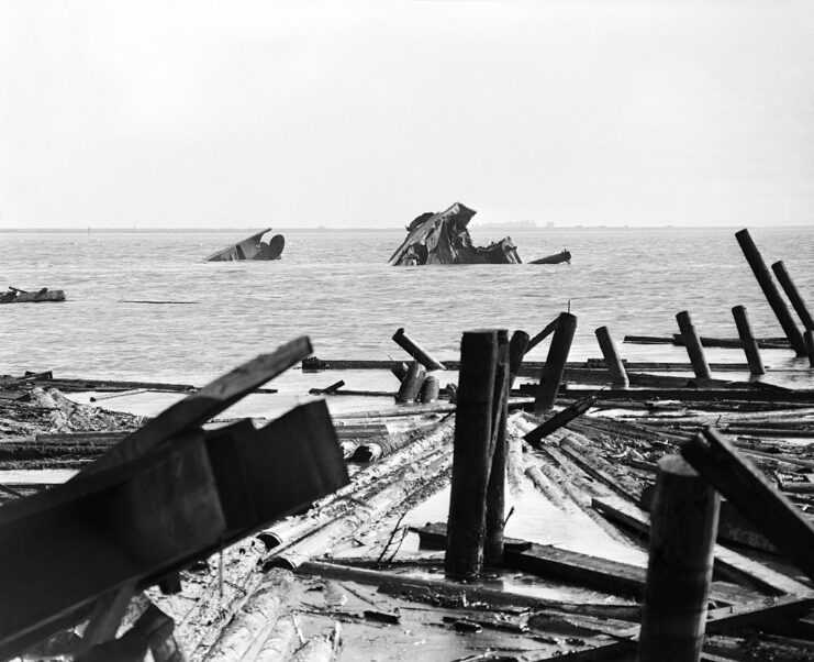 Remains of two ships sticking out of the water