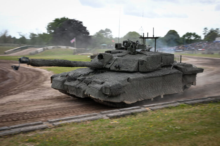 Challenger 2 driving around an arena