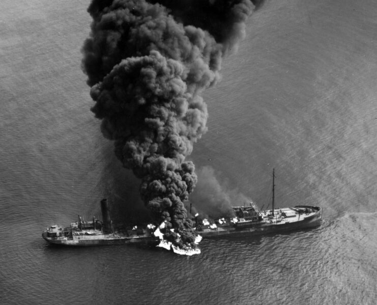 SS Byron D. Benson shrouded in smoke at sea