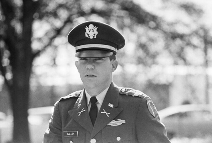 William Calley walking in his US Army uniform