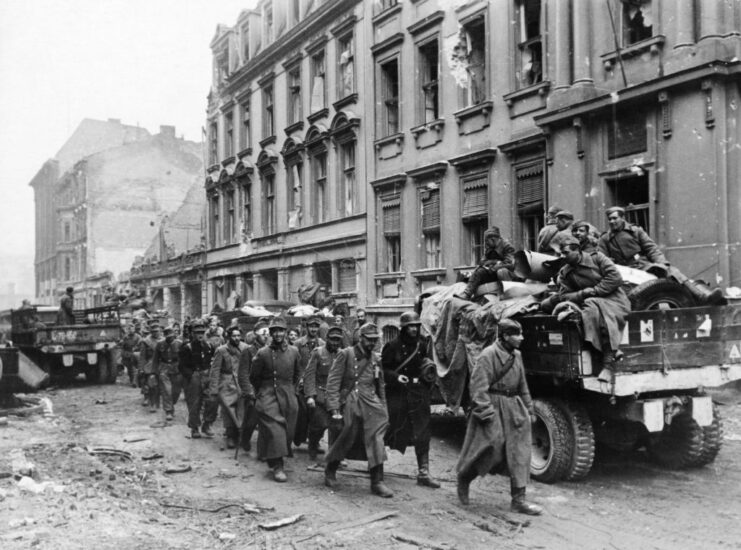 German prisoners of war (POW) walking down a street