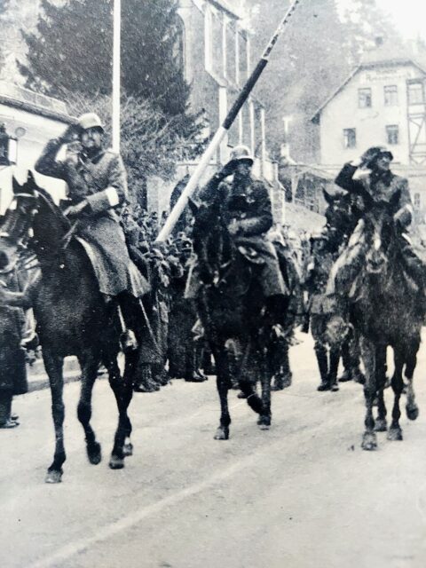 German soldiers moving through a border area on horseback