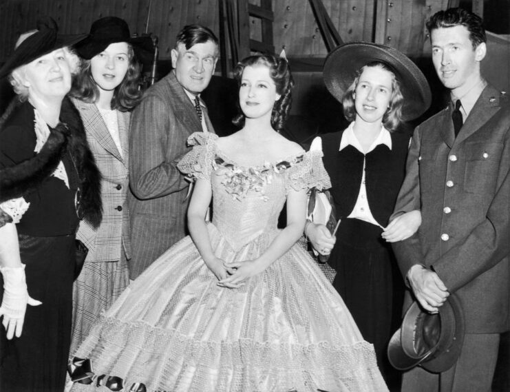 James "Jimmy" Stewart standing with members of his immediate family