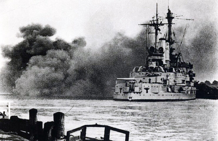 SMS Schleswig-Holstein firing her naval guns just off the shore of Westerplatte