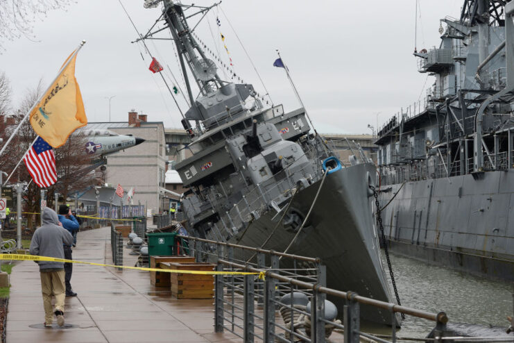 USS The Sullivans (DD-537) listing in the water