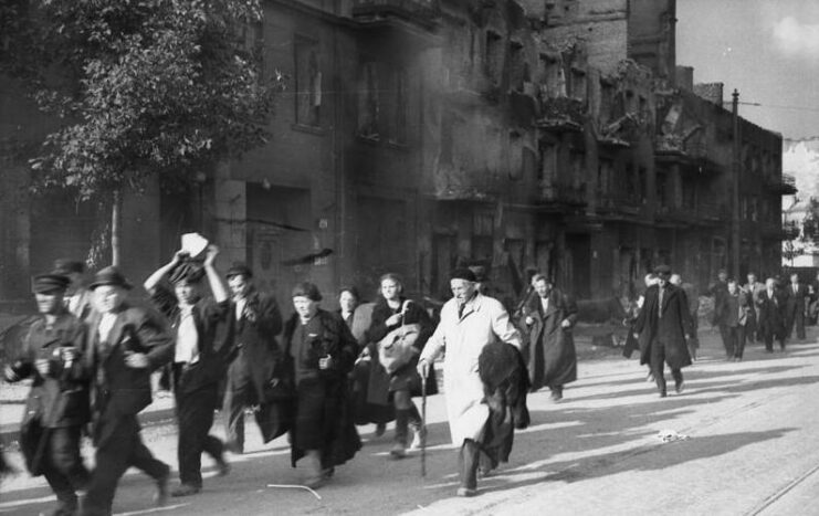 Polish civilians walking down a street