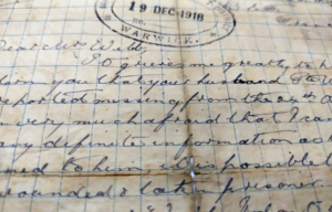 Close-up of a letter written on graph paper