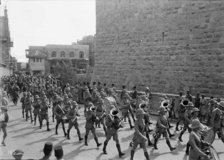 British troops marching through a street in Jerusalem