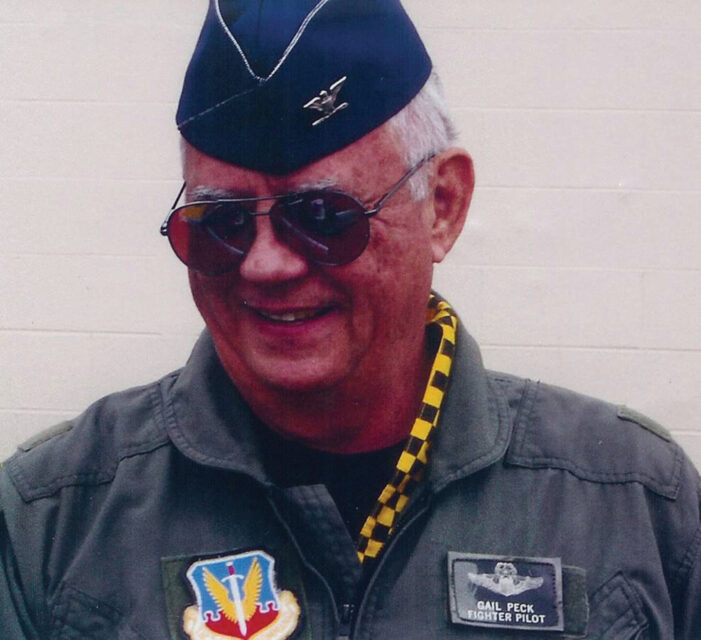 Col. Gail Peck standing in his US Air Force uniform