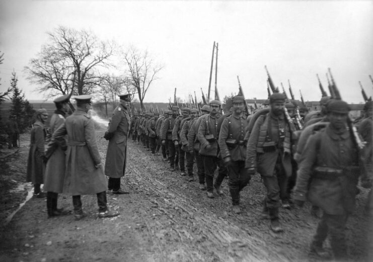 German generals inspecting infantrymen of the Wurttemberg Landwehr Infantry Regiment No120 as they walk past. 