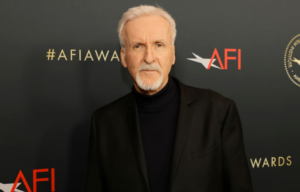 James Cameron standing on a red carpet