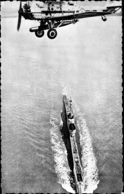 Aircraft flying over the HMS Poseidon (P99)