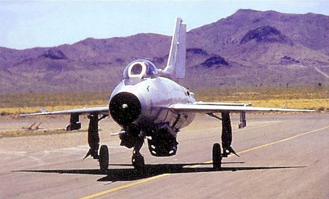 Mikoyan-Gurevich MiG-21F-13 taxiing down a runway