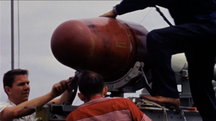 Crewmen standing around an X-17a ballistic missile